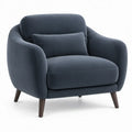 Donkerblauwe fluwelen fauteuil met sierkussen en donkerbruine poten, 90 x 85 x 82 cm